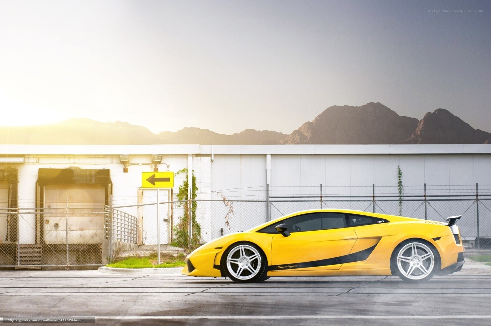 Yellow sports car in industrial area