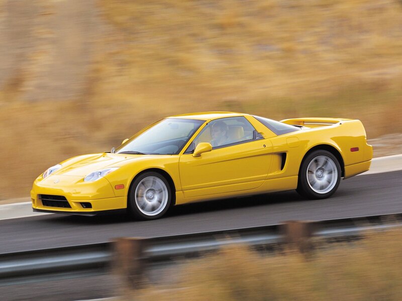 Yellow sports car in motion