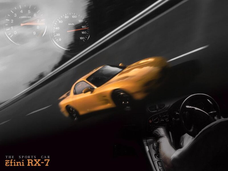 Yellow sports car in motion