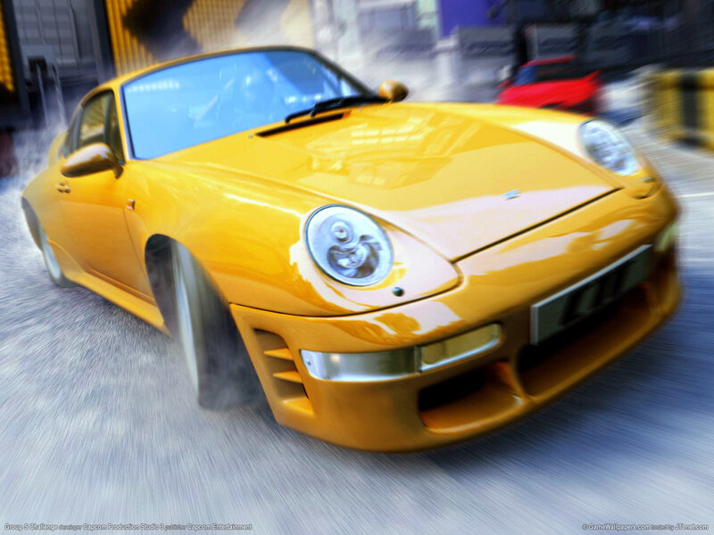 yellow sports car in motion