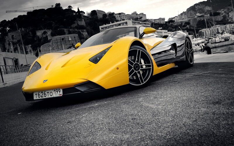 Yellow sports car in port