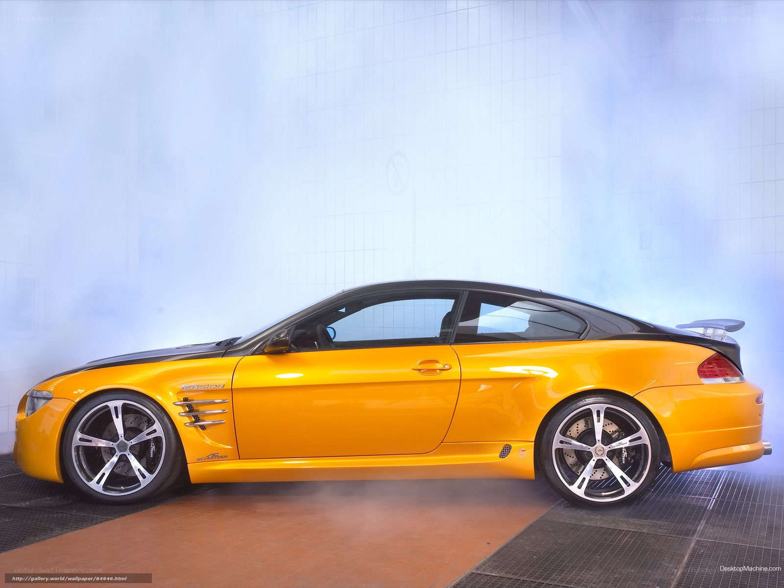 yellow sports car in studio