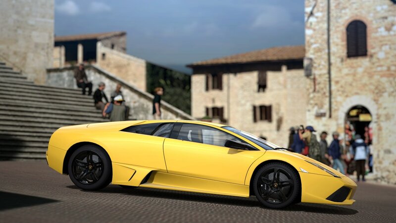 yellow sports car in town