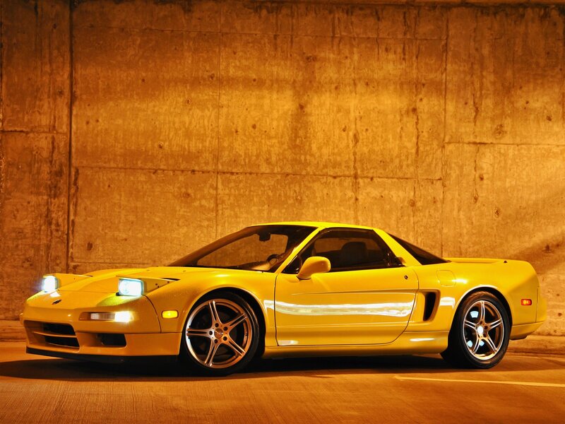 Yellow sports car in tunnel