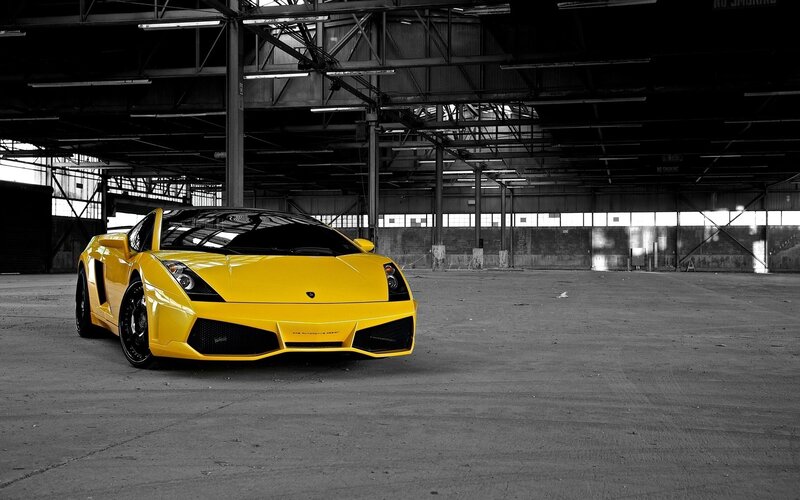 Yellow sports car in warehouse