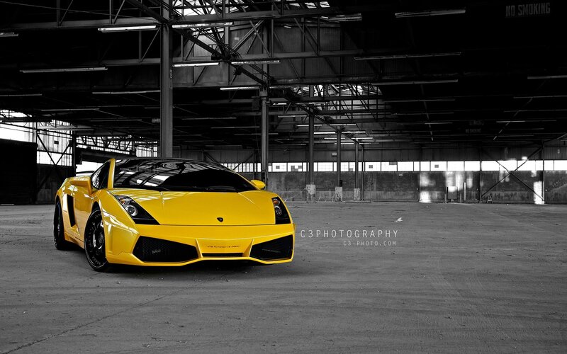 Yellow sports car in warehouse