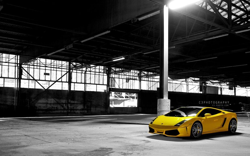 Yellow sports car in warehouse