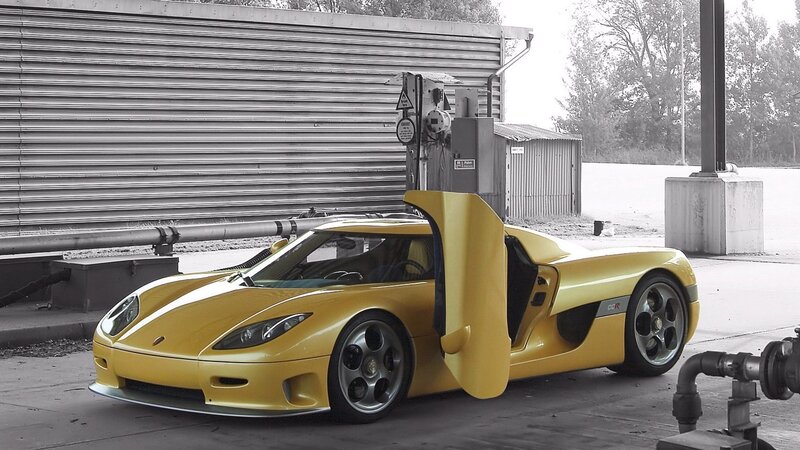 Yellow Sports Car — Industrial, Photograph, Building