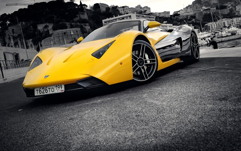 Yellow sports car on a dock