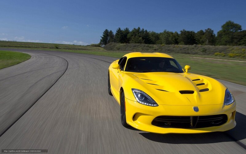 Yellow sports car on a racetrack