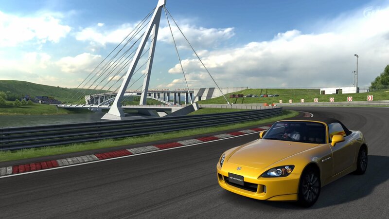 Yellow sports car on a racetrack