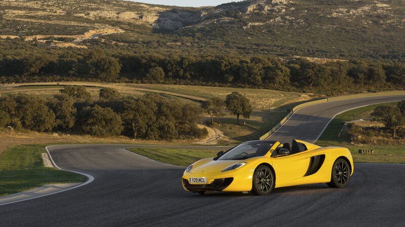 Yellow sports car on a racetrack
