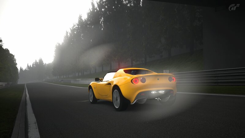Yellow sports car on a racetrack