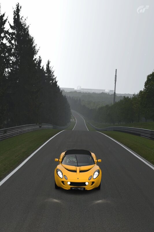 Yellow sports car on a racetrack