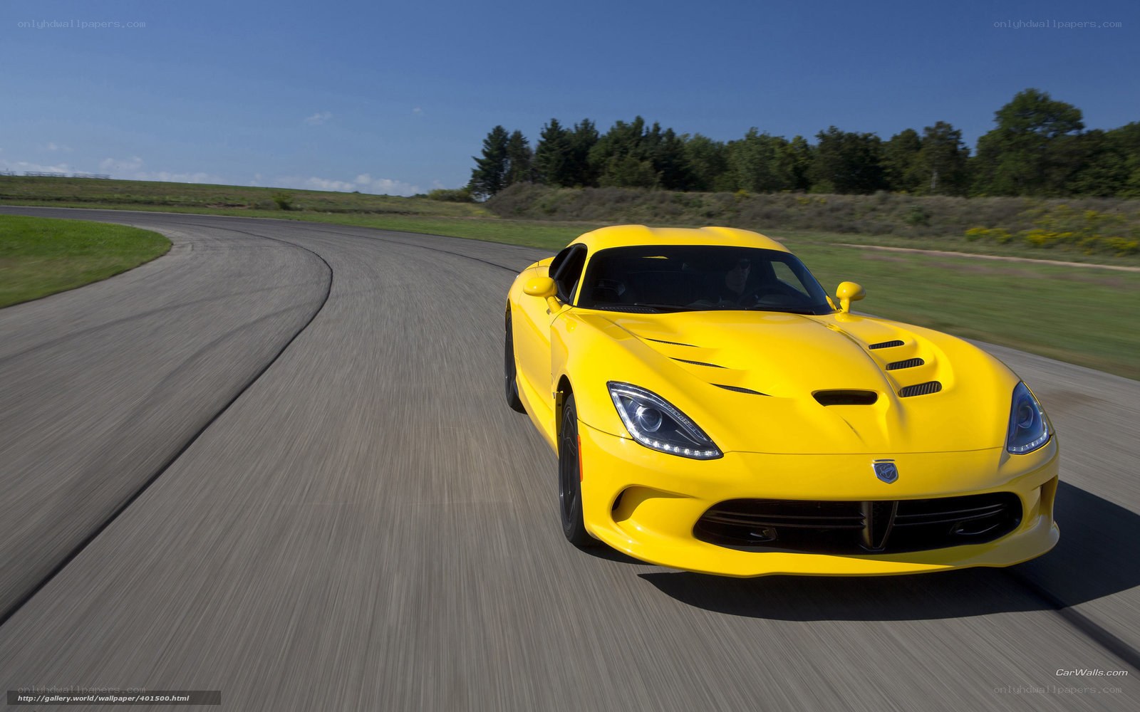 Yellow sports car on a racetrack