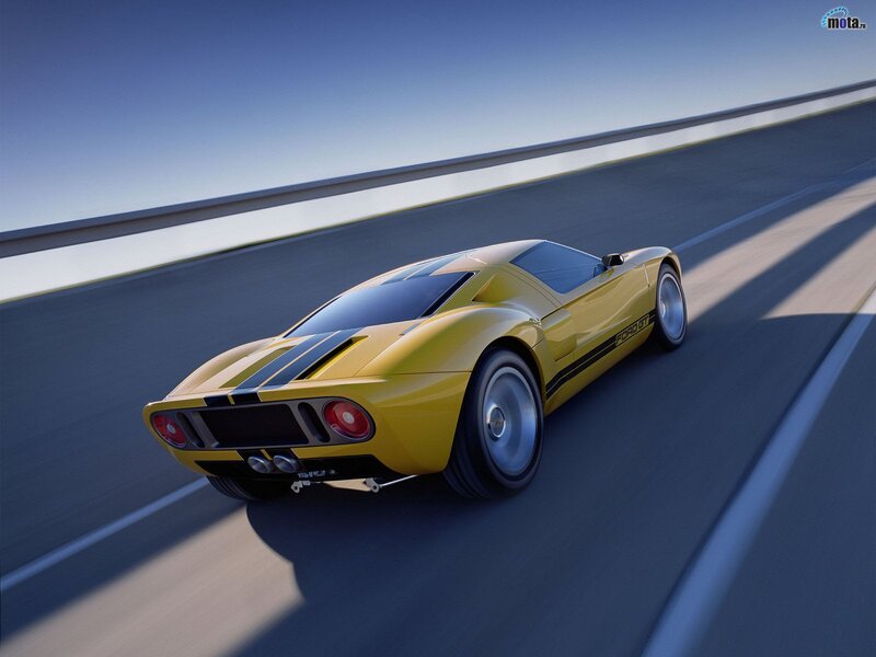 Yellow sports car on a road