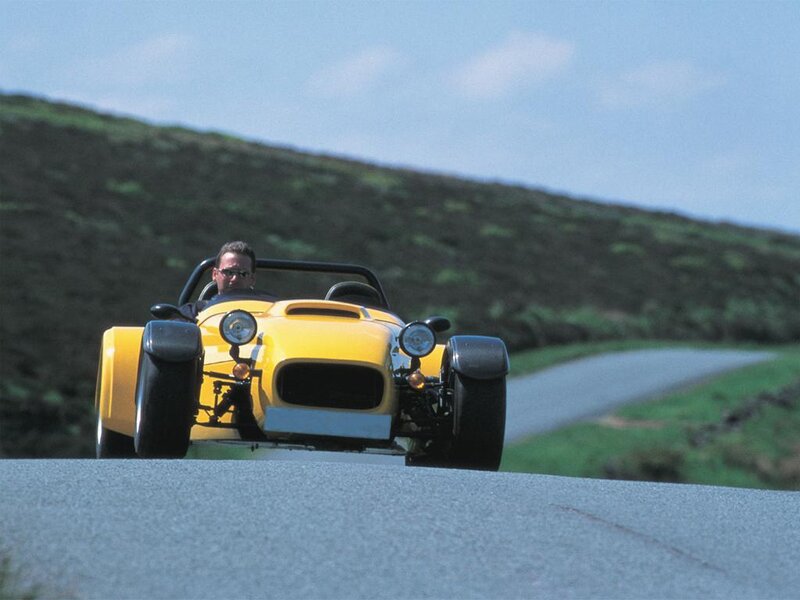 Yellow sports car on a road