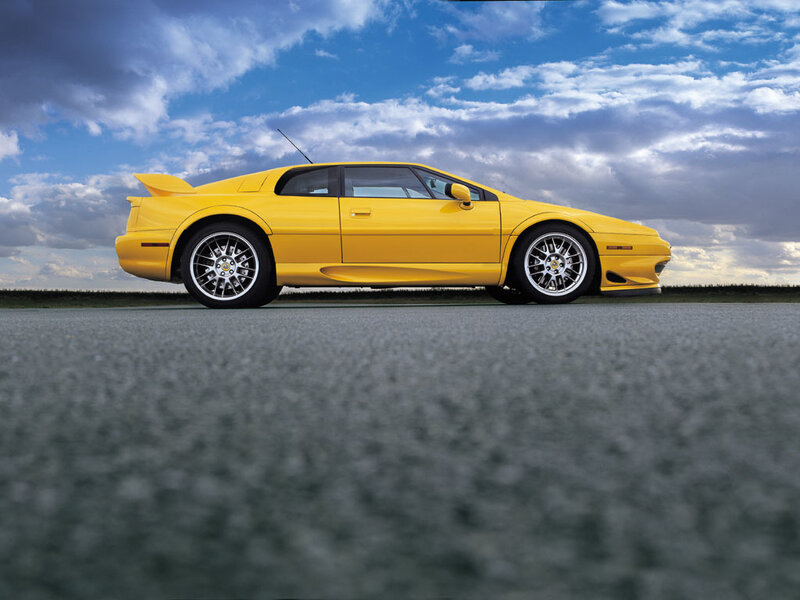 Yellow sports car on a road