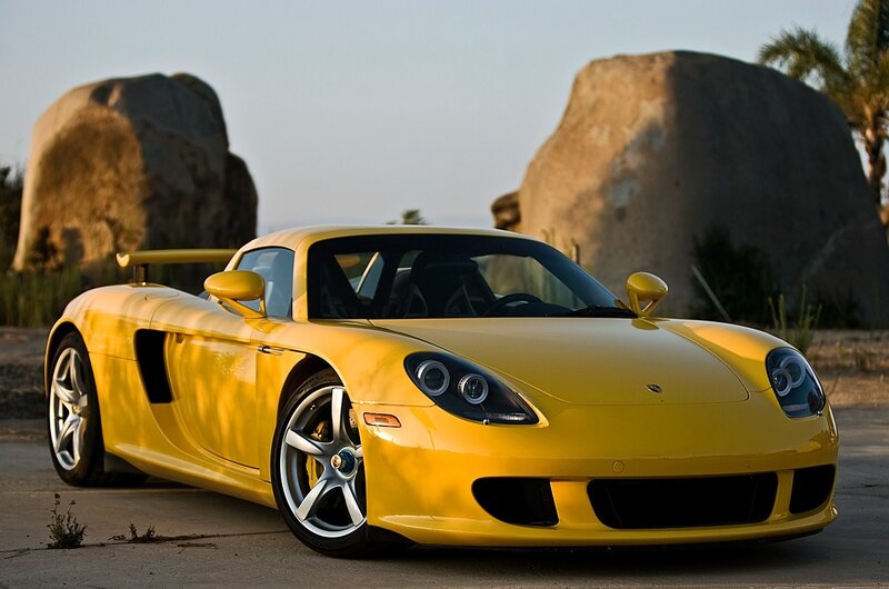Yellow sports car on a road