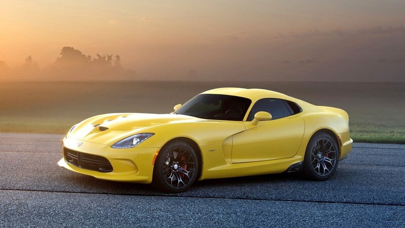 Yellow sports car on a road
