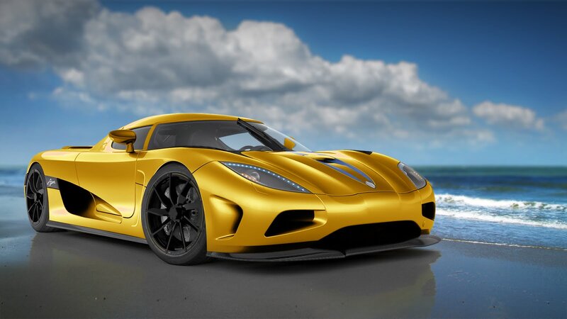 Yellow sports car on beach