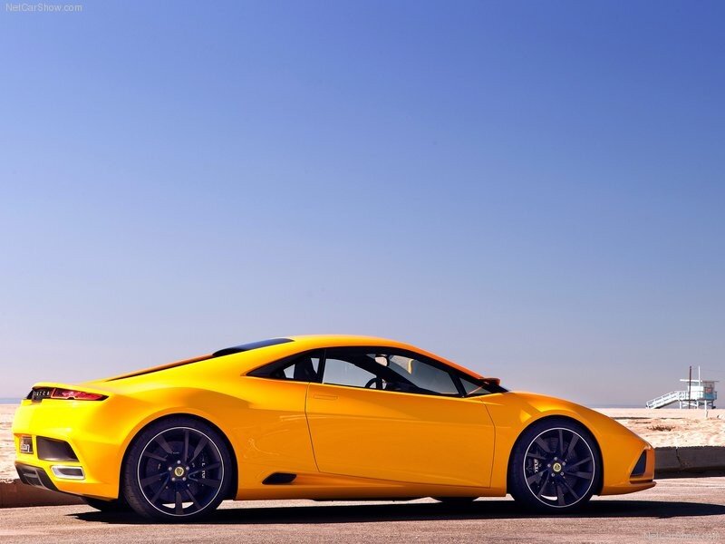 Yellow sports car on beach