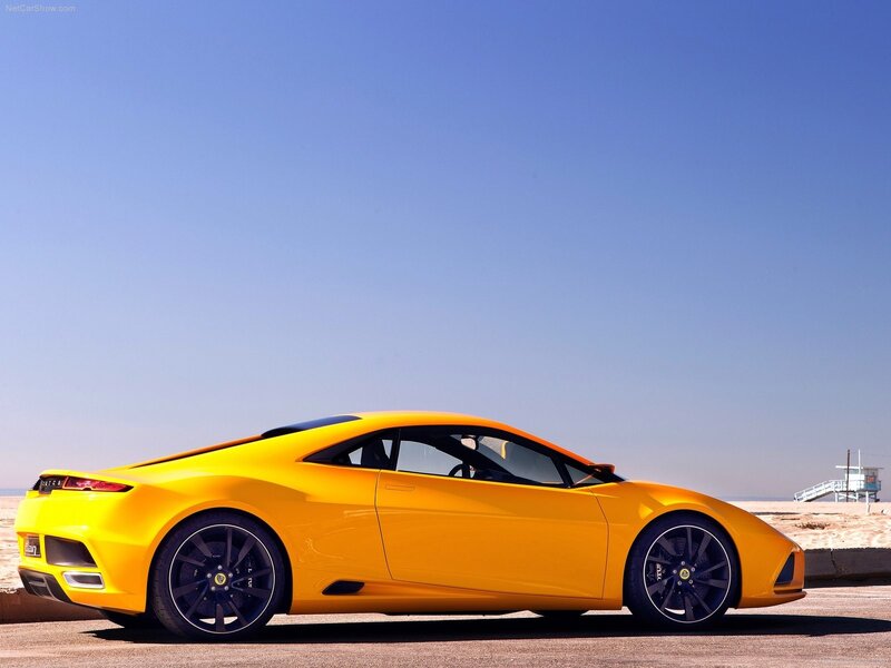 Yellow sports car on beach
