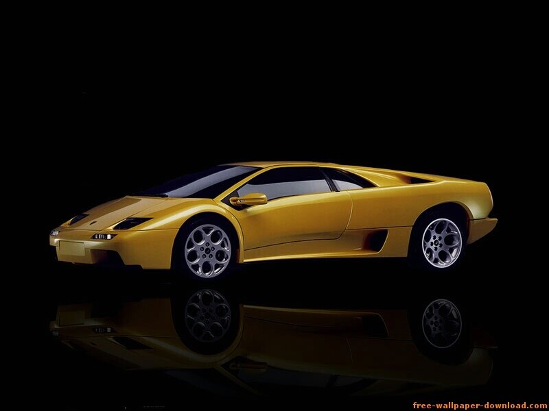 yellow sports car on black