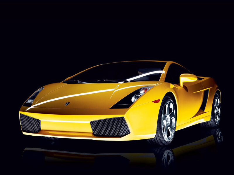 yellow sports car on black background