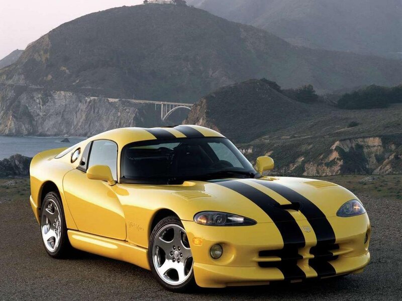 Yellow sports car on coast