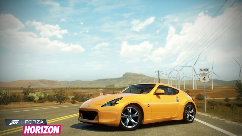 Yellow sports car on desert road