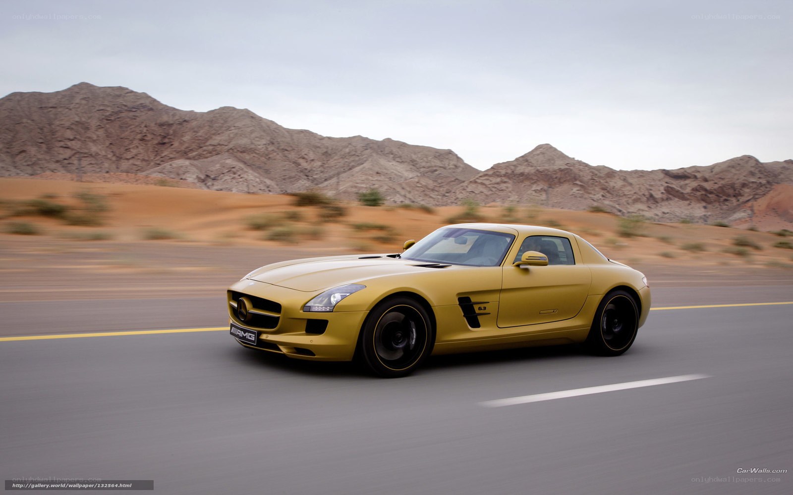 yellow sports car on desert road