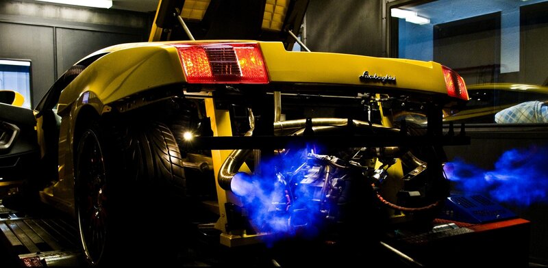 yellow sports car on dyno
