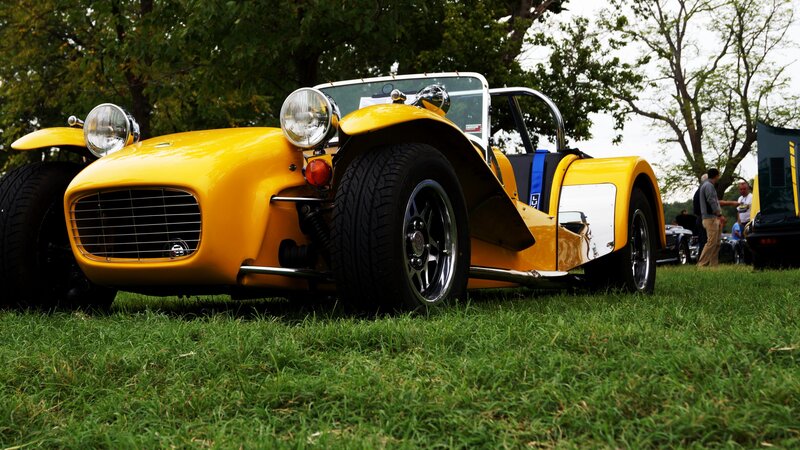 Yellow sports car on grass