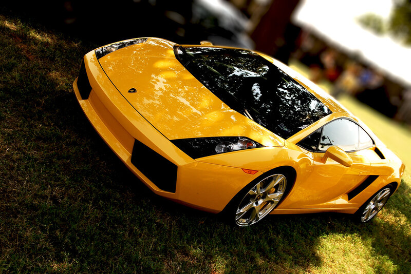Yellow sports car on grass