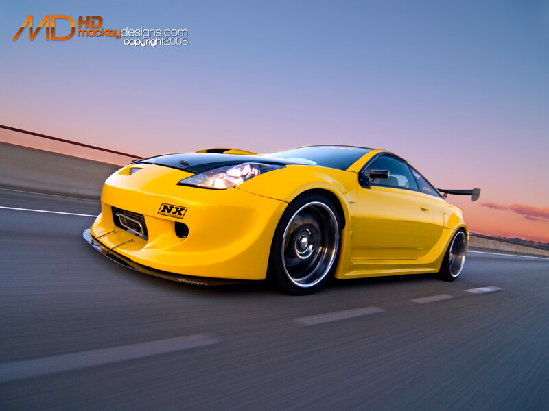 Yellow sports car on highway