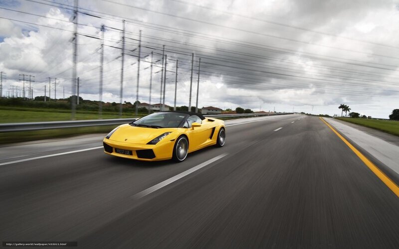Yellow sports car on highway