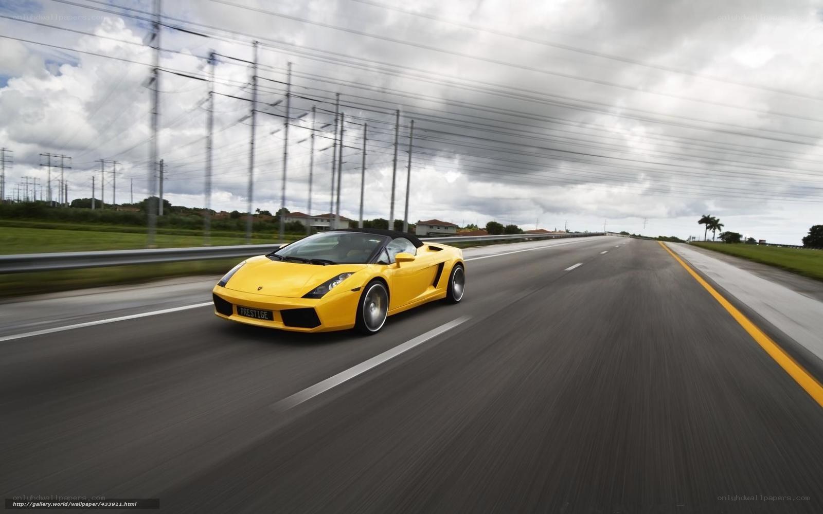 Yellow sports car on highway