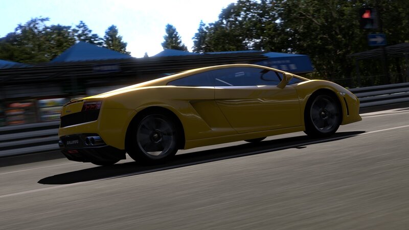 yellow sports car on racetrack