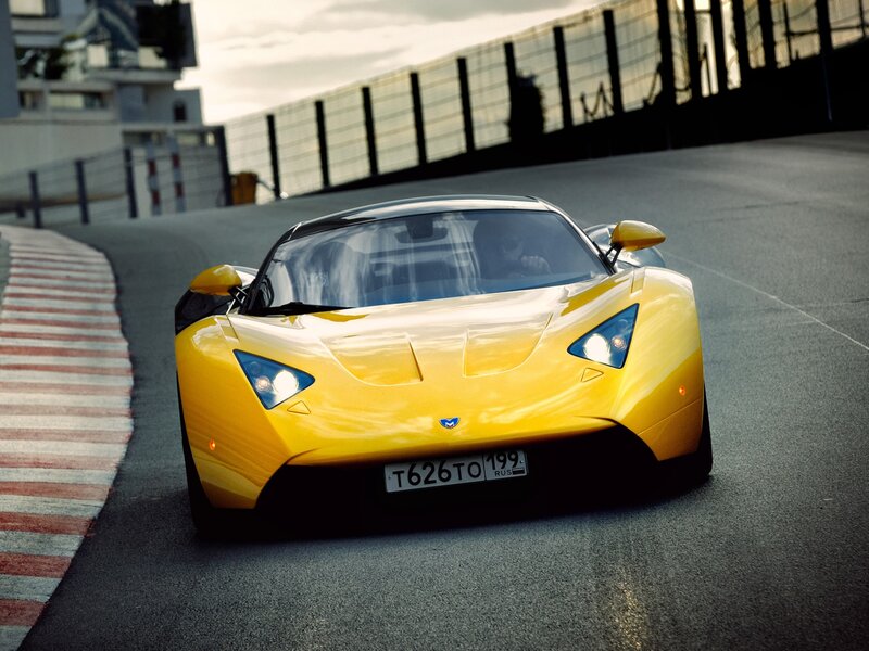 Yellow sports car on racetrack