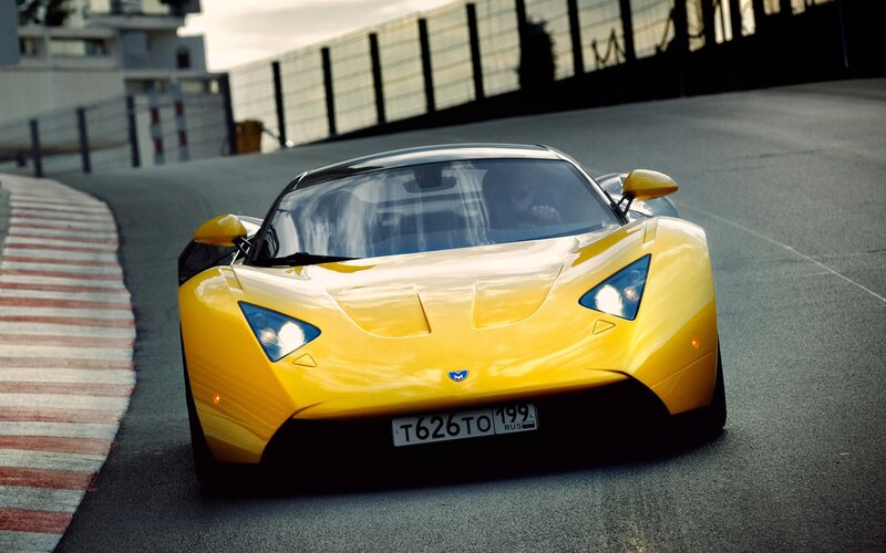 Yellow sports car on racetrack