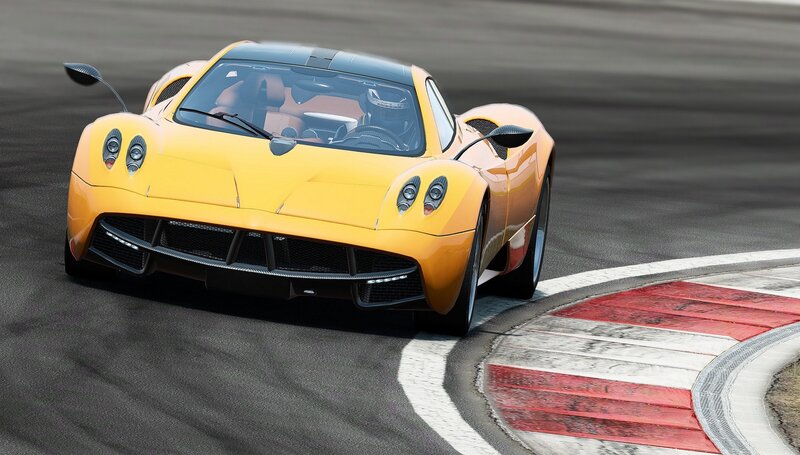 yellow sports car on racetrack