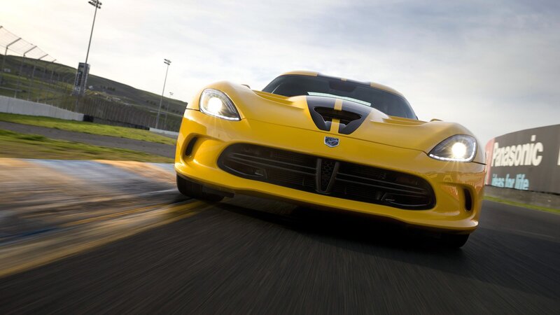 yellow sports car on racetrack
