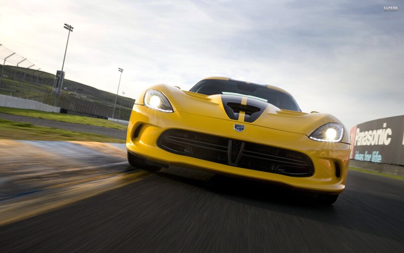 yellow sports car on racetrack