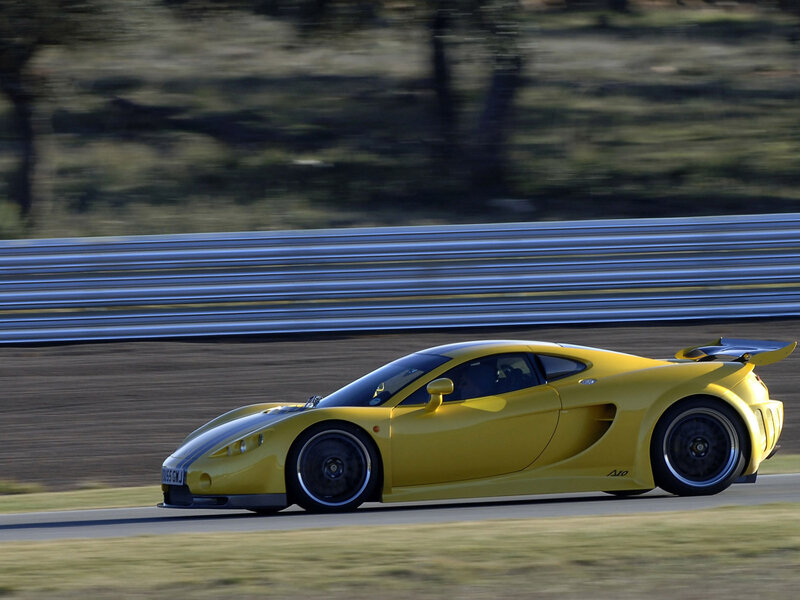 yellow sports car on racetrack