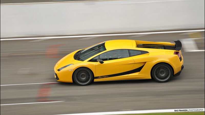 yellow sports car on racetrack