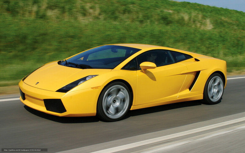 Yellow sports car on road