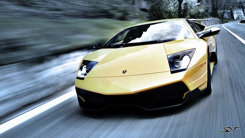 yellow sports car on road