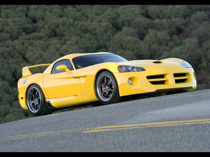 Yellow sports car on road