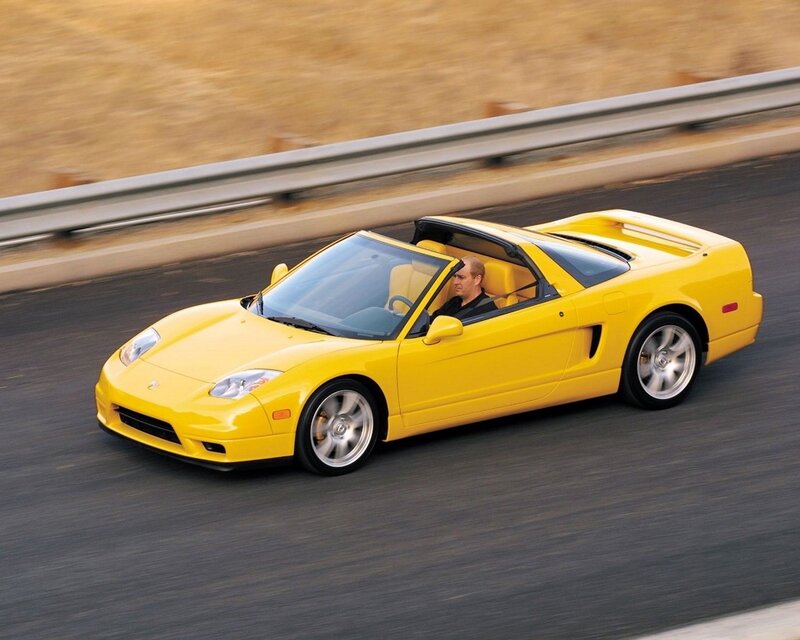 Yellow sports car on road